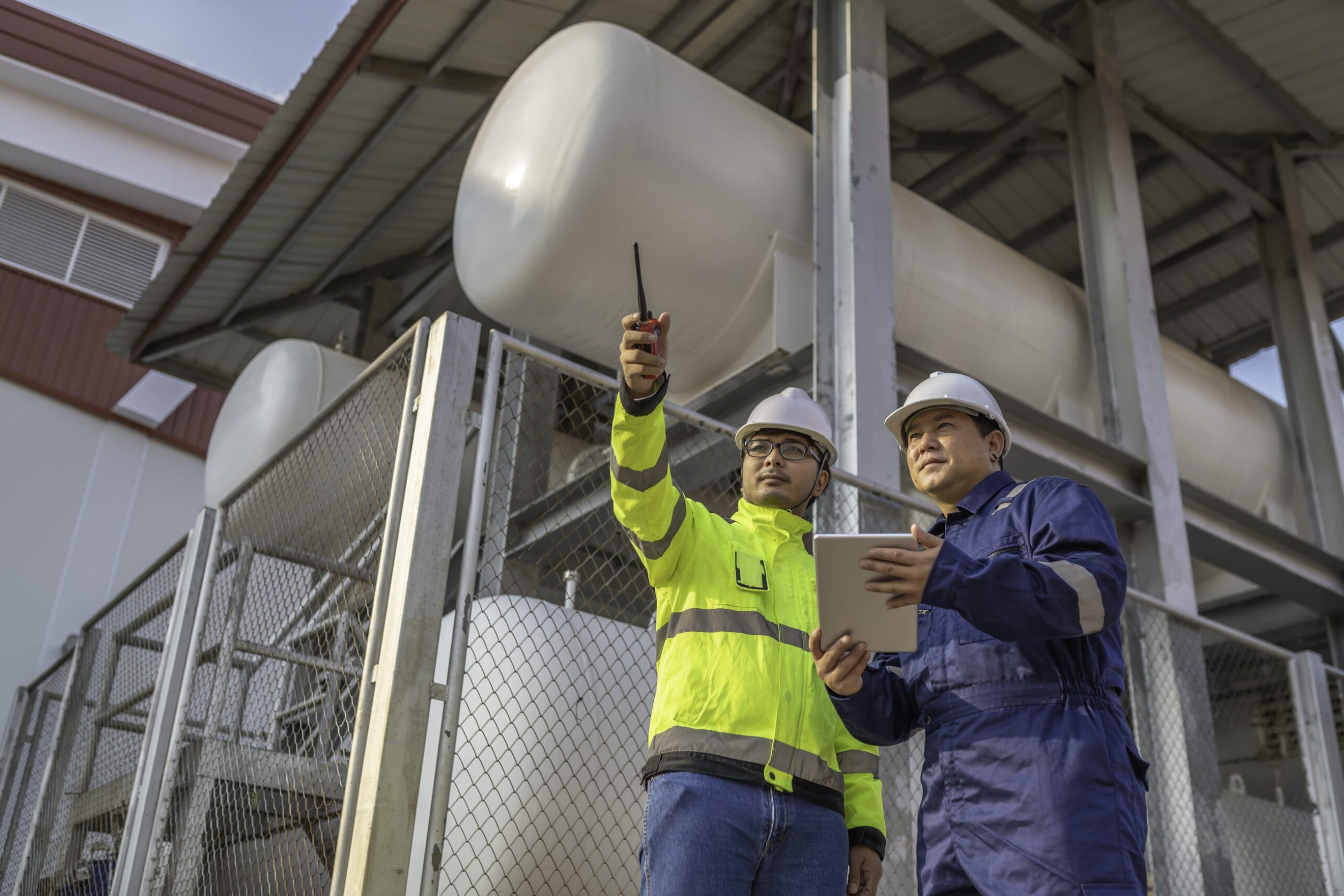 Engineers and supervisor work place to keep liquid helium,preventive maintenance schedule checking,Thailand people,Consult technical problems